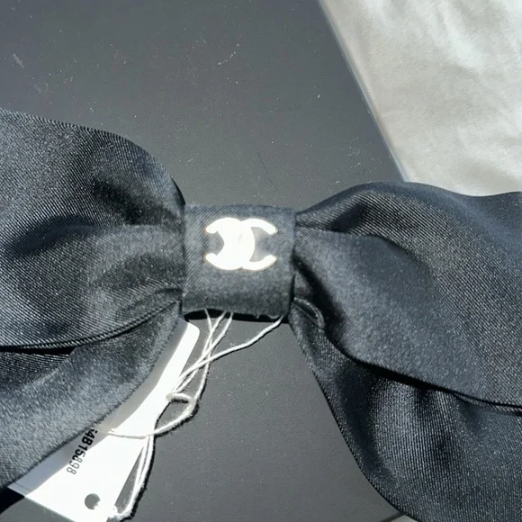 Gorgeous Chanel black bow with silver cc